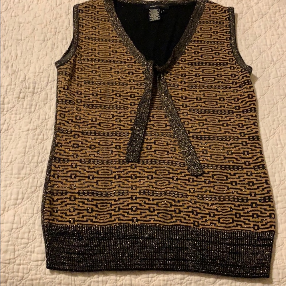 A sleeveless top BCBG